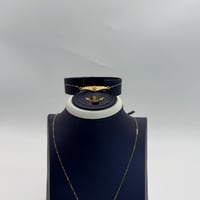 طقم ذهب جناح الصقر ذهب صافي عيار 21 وزن 3.7 جرام