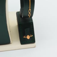 طقم ذهب عيار 21 تصميم تعليقة دائرية مزدوجة وزن 2.9...