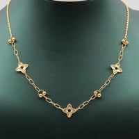 نصف طقم ذهب صافي عيار 18 – تصميم هندسي ناعم بوزن 5...