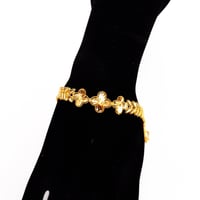 سوارة ذهب غصن الزيتون بتصميم الفان كليف عيار 21 وز...