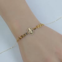 اسوارة ذهب بتفصيل دائري أنيق عيار 18 وزن 0.7 جرام