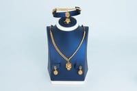 طقم ذهب التايقر عيار 21 وزن 19.6 جرام