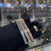 كلكشن اساور اوميقاء مطاطي ذهب عيار 18 ملونة وزن 8....