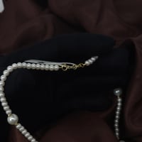 عقد مطعم بالؤلؤ الزراعي مميز بتصميم كرات الدوريكاء...