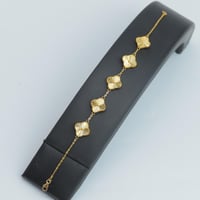 سوارة ذهب الفان كليف خمس وردات عيار 21 وزن 7.58 جر...