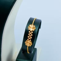 طقم ذهب الوردة بتصميم كرات الدوريكاء عيار 21 وزن 1...