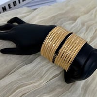 غوايش ذهب عريضة عيار 21 بوزن 9.77 جرام