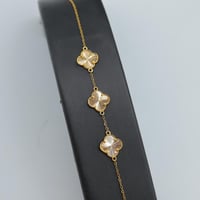 سوارة ذهب الفان كليف ثلاث وردات عيار 21 وزن 2.7 جر...