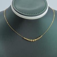 عقد ذهب كرات الببلز عيار 21 وزن 1.6 جرام