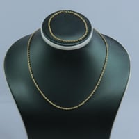 كلكشن عقد واسوارة المبروم ذهب عيار 18 وزن 2.47 جرا...