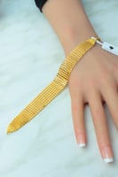 اسوارة ذهب عريضة عيار 21 بتصميم غصن زيتون وزن 14.3...