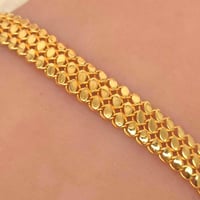 اسوارة ذهب عيار 21 تصميم غصن الزيتون بوزن 7 جرام