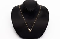 سلسال ذهب لوي فيتون تصميم الماسي عيار 18 وزن 1.1 ج...