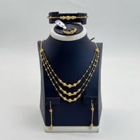 طقم ذهب ثلاثة دور تصميم بحريني عيار 21 وزن 24.5 جر...