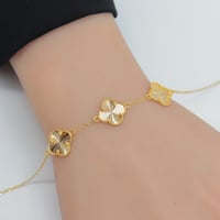 سوارة ذهب الفان كليف ثلاث وردات عيار 21 وزن 2.7 جر...