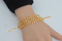 اسوارة ذهب غصن الزيتون ثلاثة دور عيار 21 وزن10.7 ج...