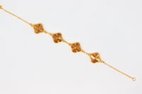 سوارة ذهب فاخرة بتصميم فان كليف عيار 21 وزن 9.4 جر...