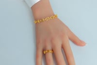 سوارة ذهب المونيكاء مع الخاتم عيار 21 وزن 12.8 جرا...