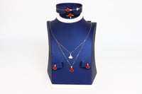 طقم بولغارى ذهب دورين تصميم الماس عيار 18 باللون ا...