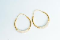 حلق ذهب مطعم بالولو عيار 21 وزن 3.4 جرام