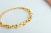 سوارة ذهب المونيكاء مع الخاتم عيار 21 وزن 12.8 جرا...