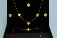 طقم ذهب الفان كليف ثلاث وردات عيار 21 وزن 9.5 جرام