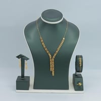 طقم ذهب عيار 21 بتصميم عصري انيق وزن 13.97 جرام