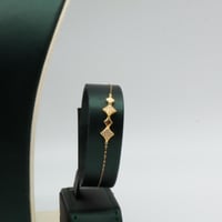 طقم ذهب تصميم الماسي عيار 18 وزن 6.2 جرام