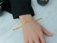 اسوارة ذهب ايطالي شكل ثلاث شرايط عيار 18 وزن 5.4 ج...