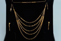 نصف طقم ذهب الشلال خمسة دور عيار 21 وزن 11.2 جرام