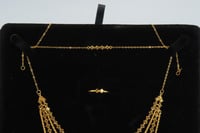 طقم ذهب اربعة دور عيار 21 وزن 11.1 جرام