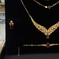 طقم جناح الصقر باللون الاحمر عيار 21