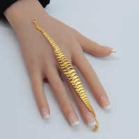 سوارة ذهب عيار 21 وزن 9.09 جرام