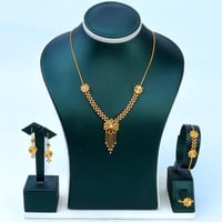 طقم ذهب الوردة بتصميم كرات الدوريكاء عيار 21 وزن 1...