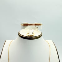 طقم المبروم ذهب صافي عيار 21 وزن 17.9 جرام