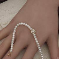 اسوارة لولو طبيعي بتصميم الماسي ذهب عيار 18 حجم صغ...