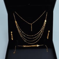 نصف طقم ذهب الشلال اربعة دور عيار 21 وزن 6.5 جرام