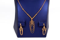 طقم ذهب عيار 21 تصميم حبات الدوريكاء بوزن 13.4 جرا...