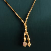 طقم ذهب تصميم كرات الدوريكاء عيار 21 وزن 7.10 جرام