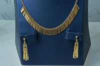 طقم ذهب تصميم انيق عيار 18 وزن 17.8 جرام