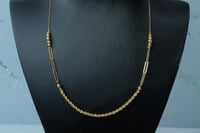 سلسال جنزير ذهب تصميم مبروم لامع عيار 18 وزن 2.4 ج...