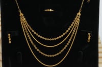 طقم ذهب اربعة دور عيار 21 وزن 11.1 جرام