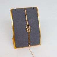 سوارة ذهب المبروم تصميم الحلقات عيار 18 وزن 1.6 جر...