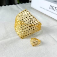 اسوارة مع خاتم ذهب عيار 21 بتصميم دراما عريض