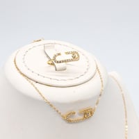 طقم ذهب مسيكاء تصميم الماسي عيار 18 وزن 3.2 جرام