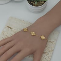 اسوارة فان كليف ذهب عيار 21 شكل ثلاثة وردات