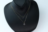 سلسال ذهب عيار 18 دورين بتصميم الماسي مزين بحجر از...