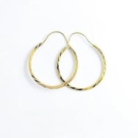 حلق ذهب مدور عيار 21 وزن 1.3 جرام