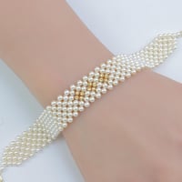 سوارة ذهب مطعم بالؤلؤ الصناعي عيار 18 وزن 0.7 جرام