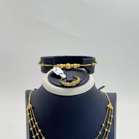 طقم ذهب ثلاثة دور تصميم بحريني عيار 21 وزن 24.5 جر...